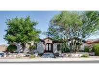 House exterior features landscaping and a welcoming front entrance at 41253 N Whistling Strait Ct, Anthem, AZ 85086