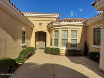 Well-maintained home with desert landscaping and a two-car garage at 22407 N Galicia Dr, Sun City West, AZ 85375