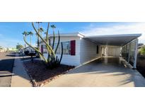 Nice manufactured home with carport and desert landscaping at 120 N Val Vista Dr # 86, Mesa, AZ 85213