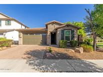 One-story home with two car garage and landscaping at 3432 E Strawberry Dr, Gilbert, AZ 85298