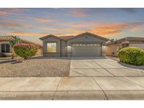 One-story house with a two-car garage and a landscaped front yard at 43809 W Elm Dr, Maricopa, AZ 85138