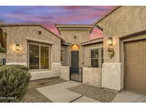 Tan house with a charming front entryway at 15201 S 183Rd Dr, Goodyear, AZ 85338