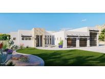 Single-story home with stucco exterior, stone accents, and 3-car garage at 28021 N 156Th St, Scottsdale, AZ 85262