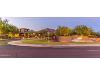 Entrance to Anthem Country Club with fountain and mountain views at 40040 N Lytham Way, Anthem, AZ 85086