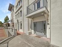 Exterior view of building showing entrance and walkway at 1081 W 1St St # 7, Tempe, AZ 85281