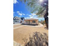 Ranch style house with a front yard at 1323 E Fillmore St, Phoenix, AZ 85006