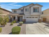 Two-story house with a two-car garage at 7715 S 69Th Ln, Laveen, AZ 85339