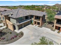 Aerial view of two-story townhome with parking at 2425 W Bronco Butte Trl # 1008, Phoenix, AZ 85085