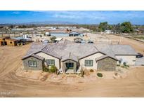 Single-Gathering home with large yard and mountain views at 11620 S 217Th Ave, Buckeye, AZ 85326