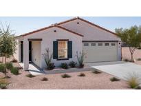 Single-story home with a two-car garage and desert landscaping at 1475 W Pima Ave, Coolidge, AZ 85128