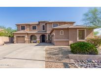 Two-story house with a large driveway and landscaping at 3702 W Riordan Ranch Rd, Phoenix, AZ 85083