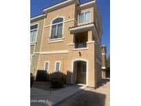 Two-story stucco building with front entrance at 2450 W Glenrosa Ave # 12, Phoenix, AZ 85015