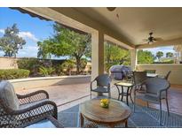 Covered patio perfect for outdoor dining and relaxation at 22303 N Montecito Ave, Sun City West, AZ 85375