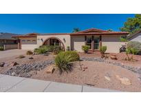 Single-story home with desert landscaping at 4622 E Flower Ave, Mesa, AZ 85206