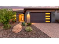 Modern home exterior with desert landscaping at 17715 E Cindercone Rd, Rio Verde, AZ 85263