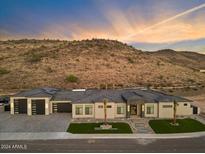 Stunning desert contemporary home with a large backyard and mountain views at 23625 N 63Rd Dr, Glendale, AZ 85310