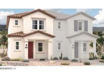 Two-story home with a red door and light-colored exterior at 2878 N Evergreen St, Buckeye, AZ 85396