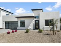Modern single story home with clean lines and desert landscaping at 100 W Northern Ave # 2, Phoenix, AZ 85021