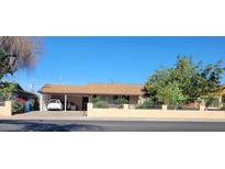 Single-story house with carport and small front yard at 2814 N 55Th Ave, Phoenix, AZ 85035