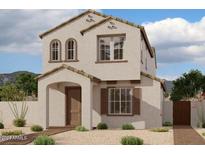 Two-story home with stucco exterior, arched windows, and a landscaped yard at 2215 W Chisum Trl, Phoenix, AZ 85085