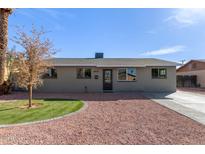 Updated single-story home with landscaped yard at 5927 W Mulberry Dr, Phoenix, AZ 85033