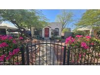 Charming house with red door and beautiful landscaping, gated entry at 2322 N 8Th St, Phoenix, AZ 85006