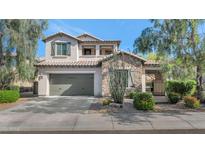 Two story home with landscaping and 3 car garage at 3730 E Cat Balue Dr, Phoenix, AZ 85050