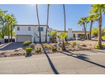 Stunning Spanish style home with palm trees at 4333 E Mcdonald Dr, Phoenix, AZ 85018