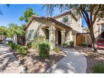 Two-story home with landscaped yard and walkway at 3778 E Santa Fe Ln, Gilbert, AZ 85297