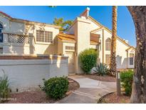 Two-story home with Spanish-style architecture and private entrance at 1717 E Union Hills Dr # 1043, Phoenix, AZ 85024