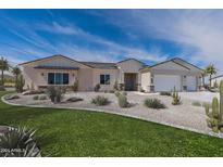 Single story home with desert landscaping and two car garage at 18080 W Amber Dr, Goodyear, AZ 85338