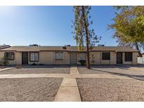 Front view of a triplex style building at 3646 N 69Th Ave # 60, Phoenix, AZ 85033