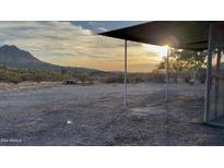 Spacious backyard with mountain views and covered patio at 48822 N Roughrider Rd, New River, AZ 85087