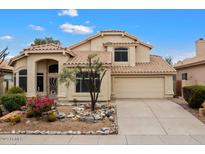 Beautiful two-story home with landscaping at 9056 E Maple Dr, Scottsdale, AZ 85255