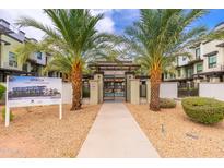 Luxury condo community featuring modern architecture and a gated entrance at 7788 E Main St # 1002, Scottsdale, AZ 85251