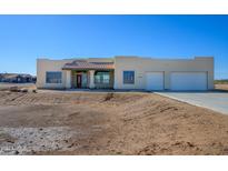 Single-story home with stucco exterior and two-car garage at 29408 N 244Th Dr, Wittmann, AZ 85361
