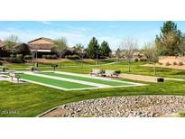 Community park with bocce ball courts, benches, and picnic areas at 901 W Witt Ave, Queen Creek, AZ 85140