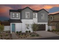 Two story home with gray siding and teal door at 9237 E Sector Dr, Mesa, AZ 85212