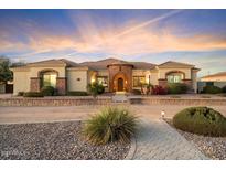 Stunning one-story home with stone accents and landscaped yard at 1356 E Loveland Ln, San Tan Valley, AZ 85140