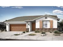 Modern home exterior with a brown door and garage at 14808 W Soft Wind Cir, Surprise, AZ 85387