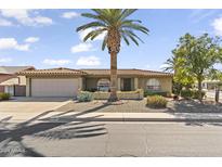 Single-story home with attached garage and desert landscaping at 4019 E Calypso Ave, Mesa, AZ 85206