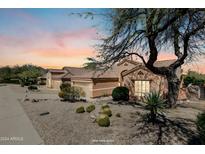 One-story home with desert landscaping and a two-car garage at 16914 E Britt Ct, Fountain Hills, AZ 85268