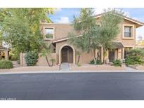 Two story stucco home with arched entryway at 10408 N 11Th St # 2, Phoenix, AZ 85020