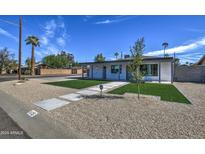 Newly renovated home with artificial turf and walkway at 3135 N 34Th St, Phoenix, AZ 85018