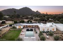 Luxury home with pool and expansive backyard, offering stunning mountain views at 5815 N Kiva Ln, Paradise Valley, AZ 85253