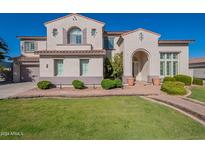 Two-story house with a landscaped front yard and walkway at 1912 E Gemini Pl, Chandler, AZ 85249