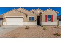 Tan two-story house with white garage door and red shutters at 7010 E Drygulch Rd, San Tan Valley, AZ 85143