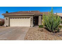 House exterior with a two-car garage at 14766 W Piccadilly Rd, Goodyear, AZ 85395