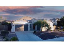 Attractive single-story home with a two-car garage at 42715 N Courage Trl, Anthem, AZ 85086