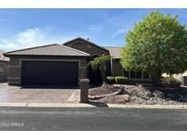 Single story home with a two car garage at 15075 W Amelia Dr, Goodyear, AZ 85395